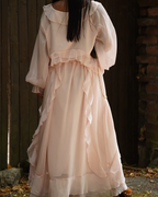 Robe longue rose fluide à volants bohème