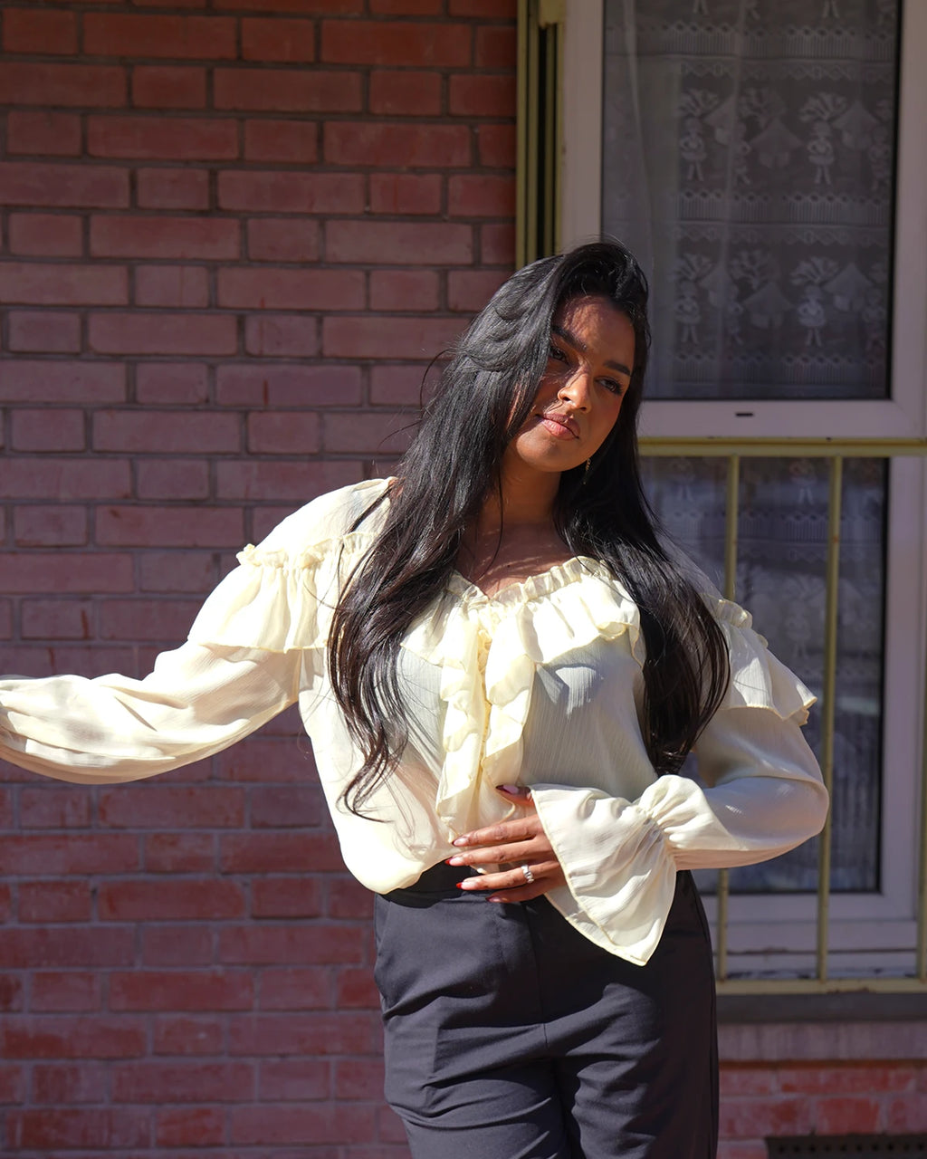 Blouse fluide à volants jaune pastel