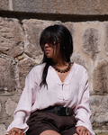 Blouse rose fermetures brandebourgs col V