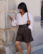 Blouse rose fermetures brandebourgs col V