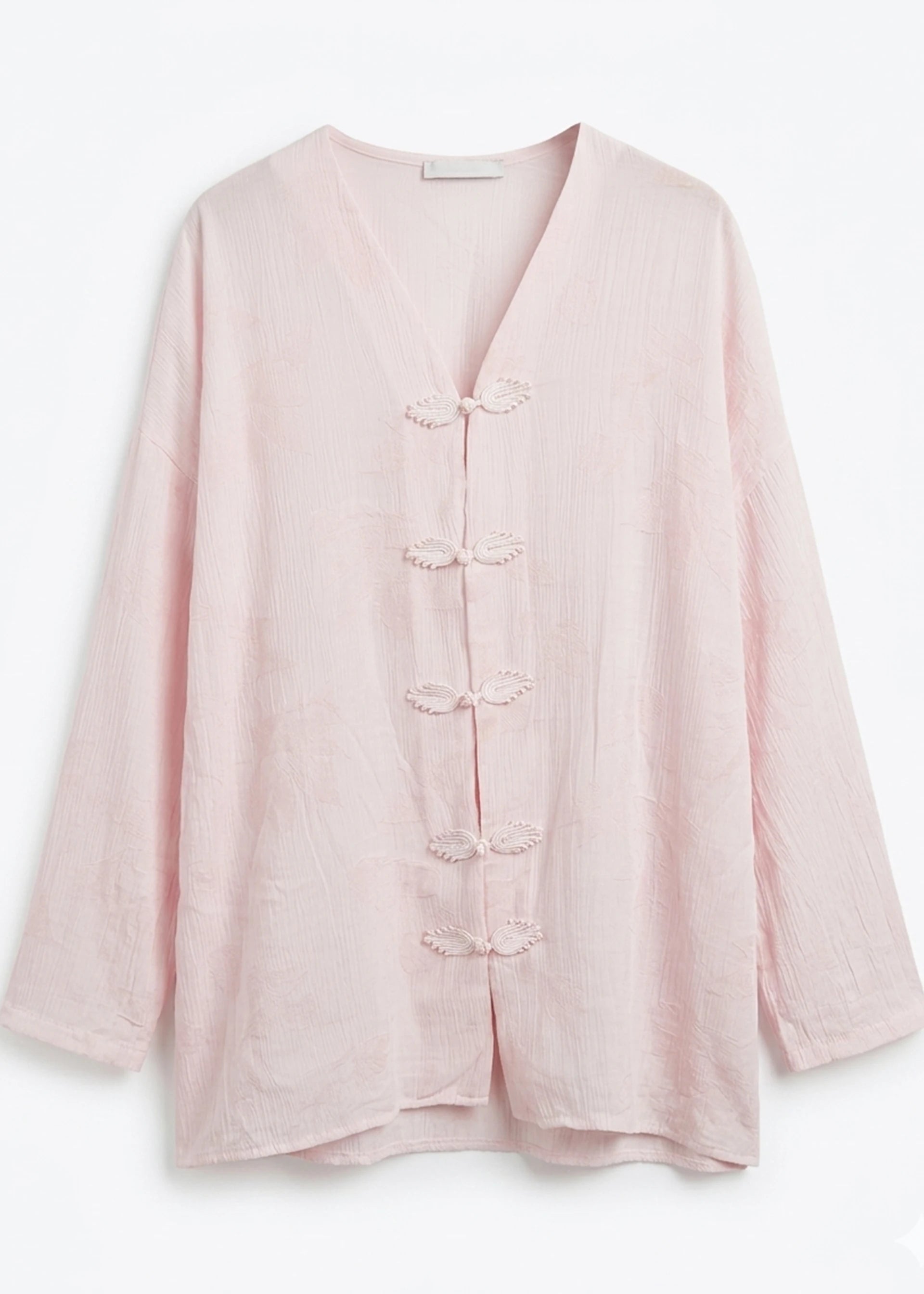 Blouse rose fermetures brandebourgs col V